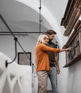 A couple is visiting a museum